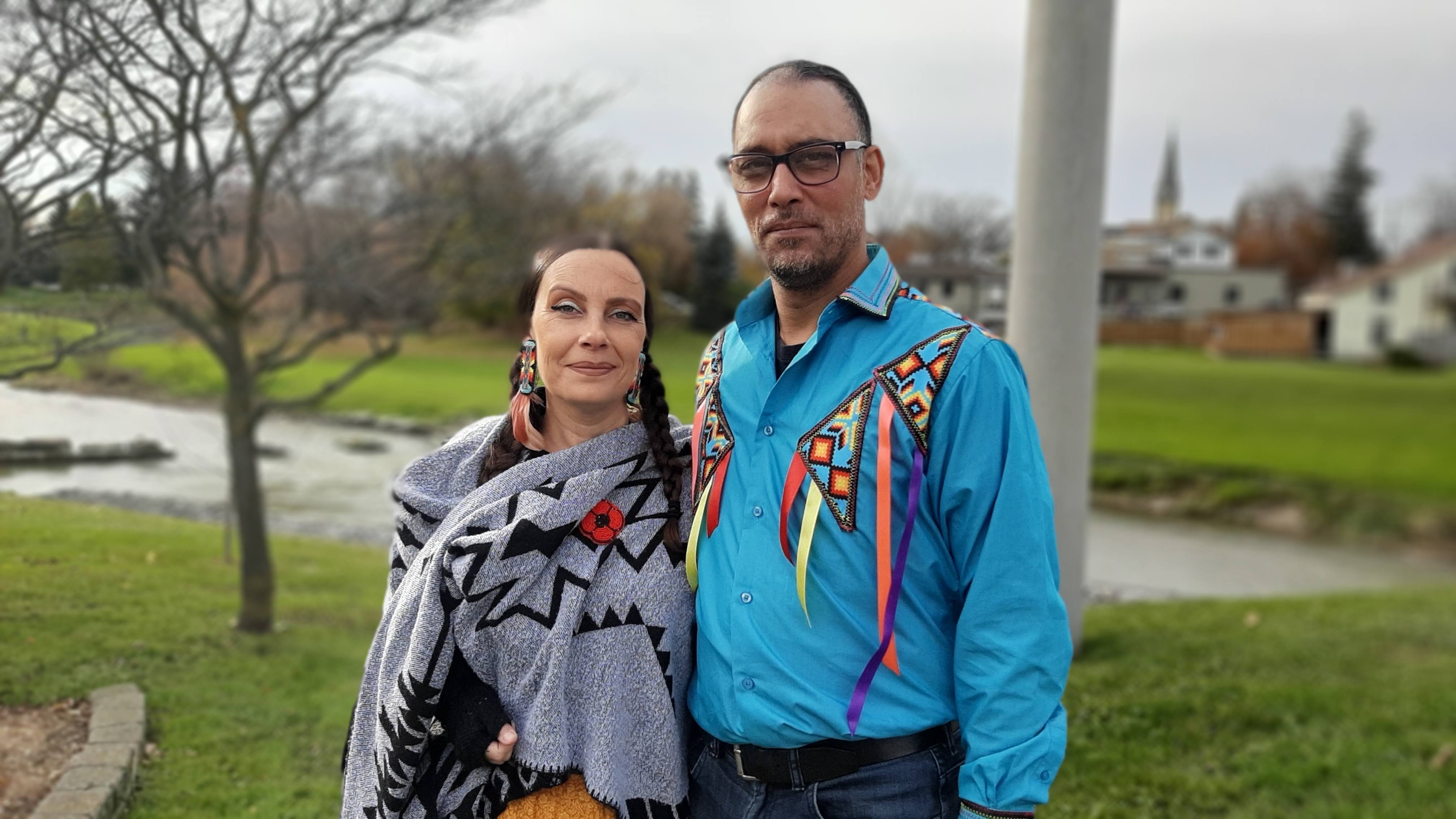 Indigenous veteran Scott Norton laid a wreath at the New Hamburg cenotaph on Nov. 11, witnessed by his wife, Anita Jacinto Norton. (Photo Nigel Gordijk) 